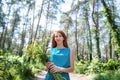 Young beautiful woman with green eyes holding yellow flowers Royalty Free Stock Photo