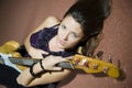 Young beautiful woman with guitare