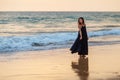 Young beautiful woman has fun at the ocean in summertime Royalty Free Stock Photo