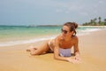 Young beautiful woman has fun at the ocean in summertime Royalty Free Stock Photo