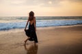 Young beautiful woman has fun at the ocean in summertime Royalty Free Stock Photo