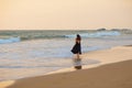 Young beautiful woman has fun at the ocean in summertime Royalty Free Stock Photo