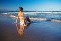 Young beautiful woman has fun at the sea in summertime Royalty Free Stock Photo