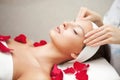 Young Beautiful Woman Having Facial Massage Royalty Free Stock Photo