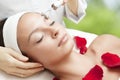 Young Beautiful Woman Having Facial Massage Royalty Free Stock Photo