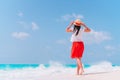 Young beautiful woman having fun on tropical seashore.