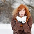 Young beautiful woman having fun in winter Royalty Free Stock Photo