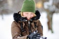 Young beautiful woman having fun in winter park Royalty Free Stock Photo