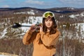 A young beautiful woman in a helmet and glasses Royalty Free Stock Photo