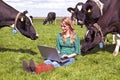 Young beautiful woman with her laptop