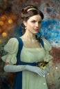 A young beautiful woman in a historical dress with flowers on a colorful blue background. Book Cover
