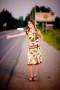 Young beautiful woman hitchhike Royalty Free Stock Photo