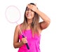 Young beautiful woman holding badminton racket stressed and frustrated with hand on head, surprised and angry face Royalty Free Stock Photo