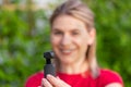 Woman holding DJI Osmo Camera