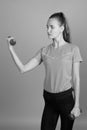 Young beautiful woman holding dumbbells ready for exercise Royalty Free Stock Photo