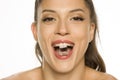 Young beautiful woman holding ice cube in her mouth Royalty Free Stock Photo