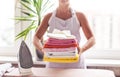 Young beautiful woman ironing clothes. Housework Royalty Free Stock Photo