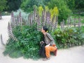 Young beautiful woman in Jardin des Plantes, Paris Royalty Free Stock Photo