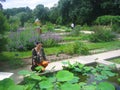 Young beautiful woman in Jardin des Plantes, Paris Royalty Free Stock Photo