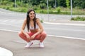 young beautiful woman jogging, fitness outfit, listening to music on headphones, smartphone, skinny perfect slim body, healthy Royalty Free Stock Photo