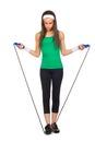 Young beautiful woman with jump rope Royalty Free Stock Photo