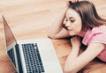 Young beautiful woman with laptop notebook on floor home surfing internet Royalty Free Stock Photo