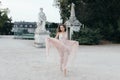 Young beautiful woman in long rose evening dress Royalty Free Stock Photo