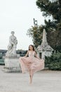 Young beautiful woman in long rose evening dress Royalty Free Stock Photo