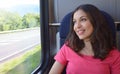 Young beautiful woman looking through the train window. Royalty Free Stock Photo