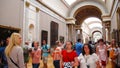 Young beautiful woman in Louvre museum, Paris