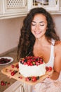 Young beautiful woman making cake at the kitchen Royalty Free Stock Photo