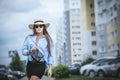 Young beautiful woman model lady fancy shirt and hat with bag on Royalty Free Stock Photo