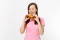 Young beautiful woman with open mouth holding in hands burger, trying to eat isolated on white background. Proper Royalty Free Stock Photo