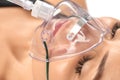 Young beautiful woman with oxygen mask in the hospital