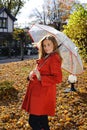 Young beautiful woman in the park in a fashion shot Royalty Free Stock Photo