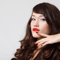 young beautiful woman with pefect long hair and vivid red lipstick