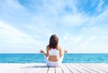 Young and beautiful woman on a pier at summer Royalty Free Stock Photo