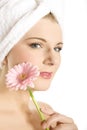Young beautiful woman with pink gerber flower Royalty Free Stock Photo