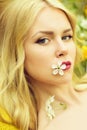 Young beautiful woman portrait, girl in spring with cherry flower Royalty Free Stock Photo