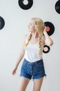 Young beautiful woman posing with white t-shirts