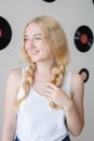 Young beautiful woman posing with white t-shirts