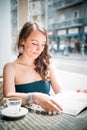 Young beautiful woman reading book Royalty Free Stock Photo