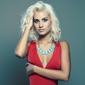 Young beautiful woman in red dress.Sexy Blond girl Royalty Free Stock Photo