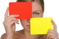 Young beautiful woman with red and yellow card Royalty Free Stock Photo