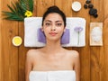 Young beautiful woman relax in aroma spa wellness center Royalty Free Stock Photo