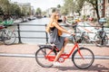 Woman with bicycle in Amsterdam city Royalty Free Stock Photo