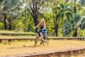 Young beautiful woman riding a bicycle in a park. Active people. Outdoor Royalty Free Stock Photo