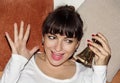 Young beautiful woman ringing christmas hand bell