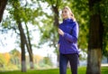 Young Beautiful Woman Running in the Autumn Park Royalty Free Stock Photo