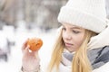 young beautiful woman sad in winter. the girl is lonely.